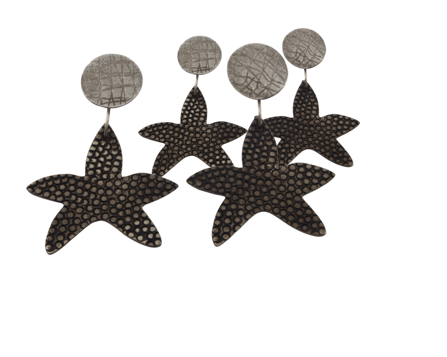 black starfish earrings by janine combes
