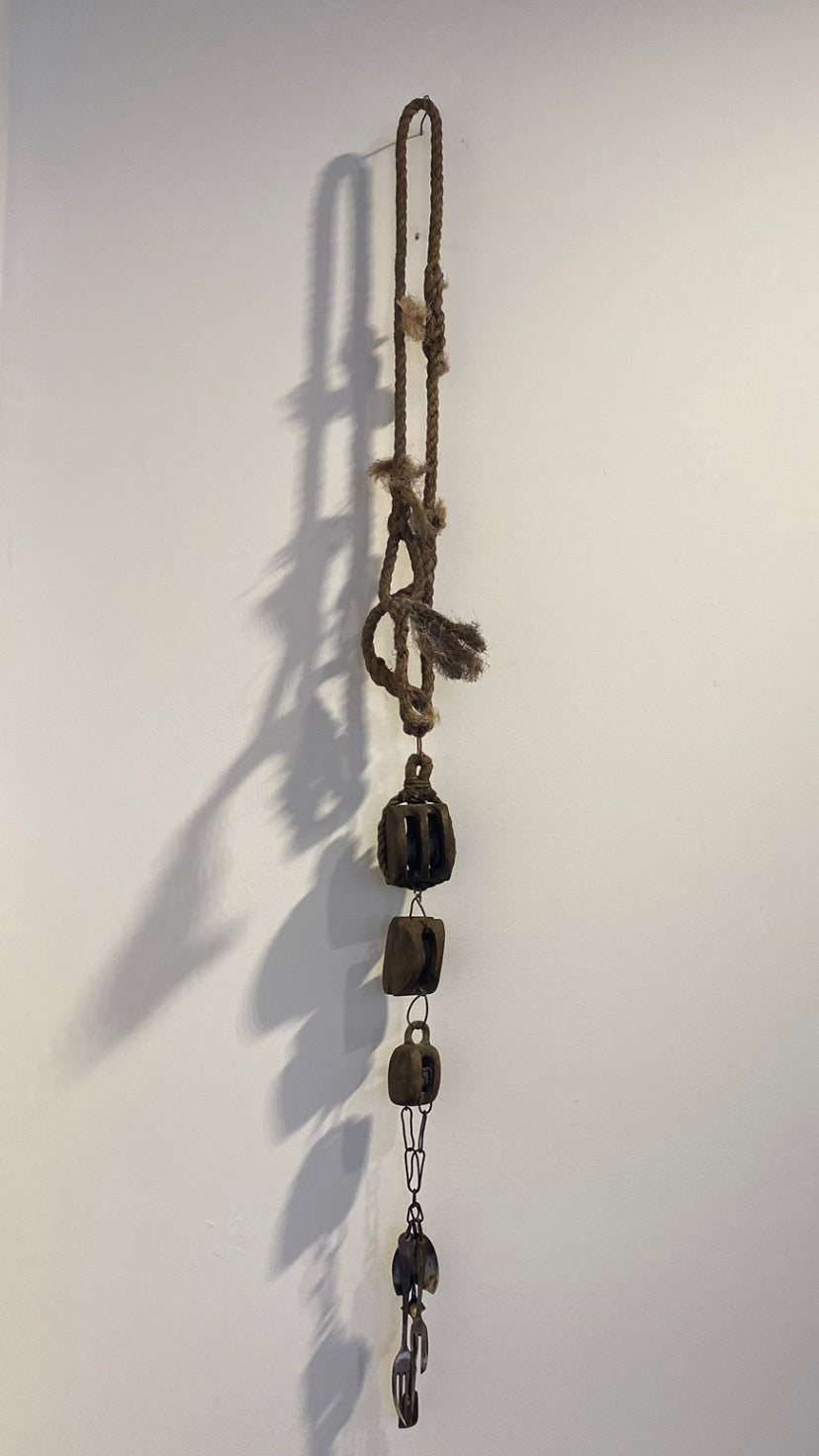 necklace made from ships pulleys and rope with engraved cultlery