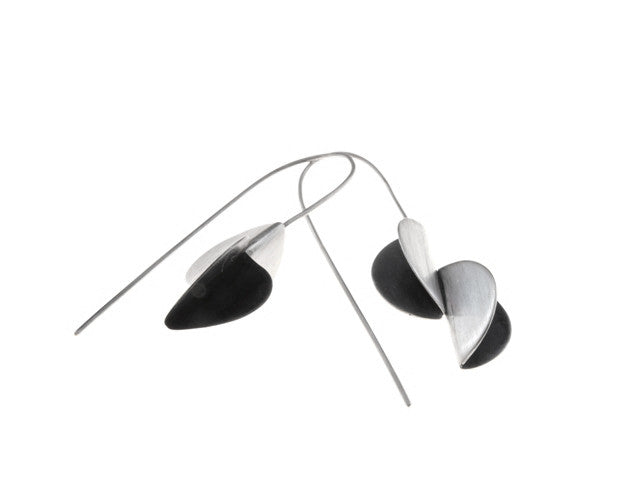 Fold earrings have a simple stylish form but are a great everyday earring. They are made from sterling silver with a black patina in the centre. 