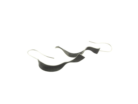 kelp line earrings are made from sterling silver which has been oxidised to gain the black colour. Each piece is hand-made so the sizes vary. Please contact me to enquire about these earrings. 