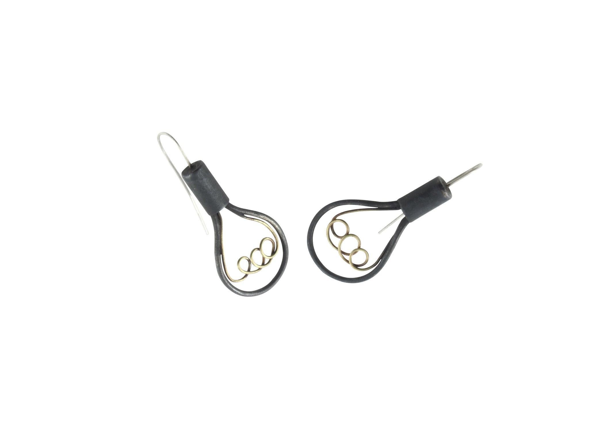 these earrings are based on vintage light bulb shapes and are made from sterling silver and brass