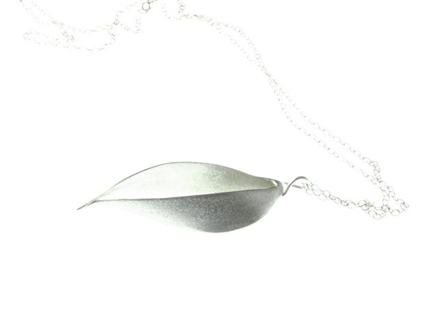 Flow necklace by Janine Combes is produced in her studio on Bruny Island, Tasmania. It is made from sterling silver and has a sterling silver chain. 