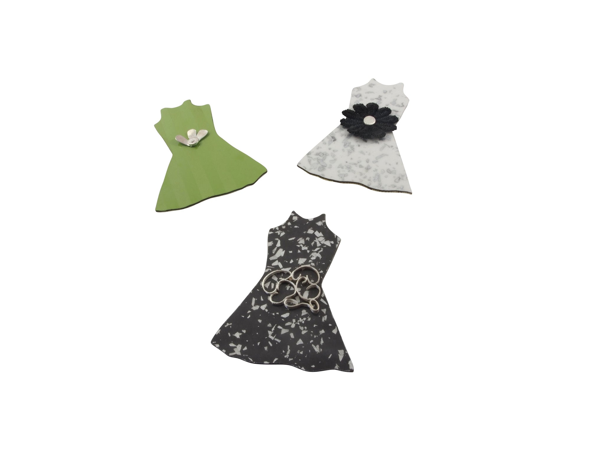 The dressmaker brooches